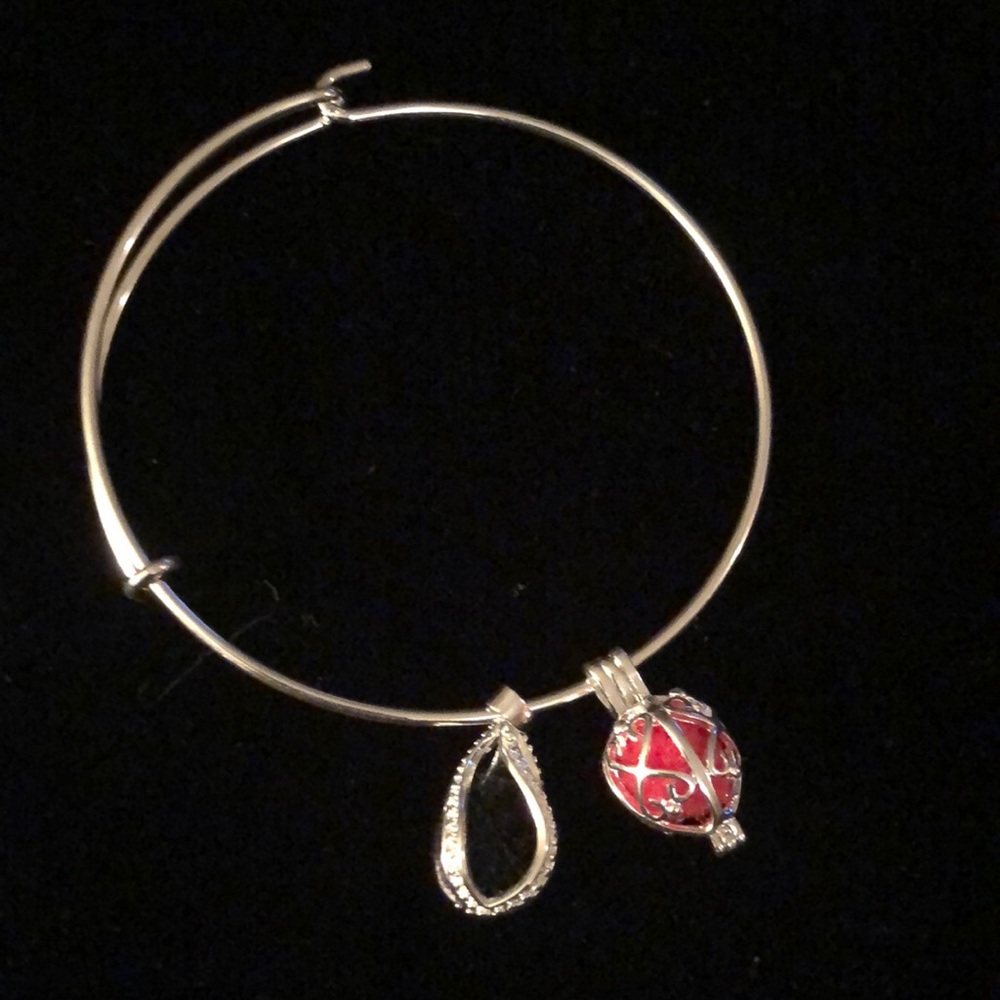 Essential Oil Diffuser Bracelet silver with charms.